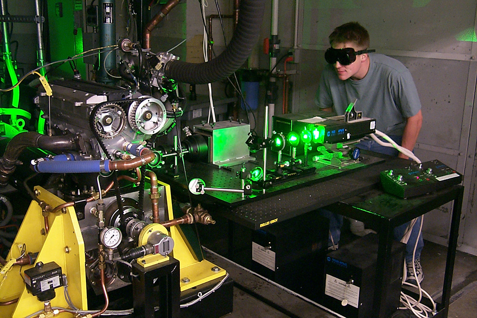 Adam Vokac Performing Laser-Induced Fluorescence Experiment at Massachusetts Institute of Technology (MIT)